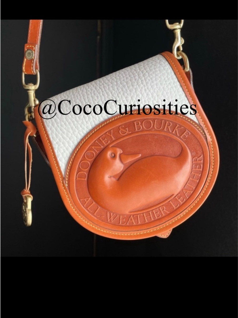 Dooney and Bourke Awl big duck white leather crossbody bag